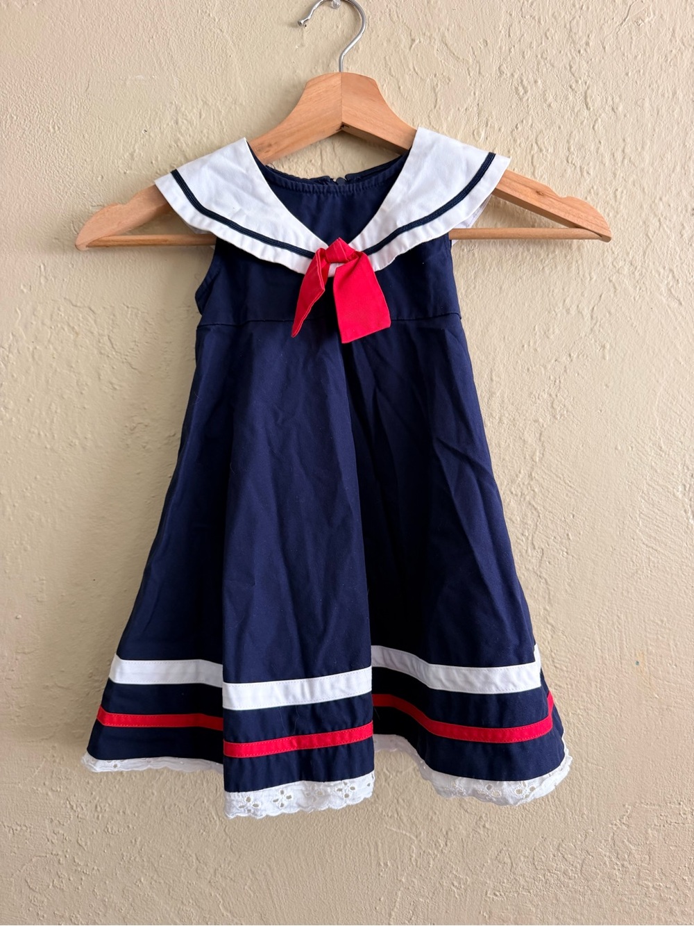 Navy Sailor-Style Girls Dress with Red Bow Accent